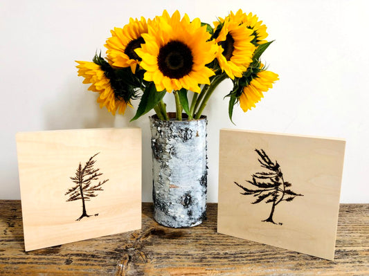 Pair of wood burned windswept pines on birch panels